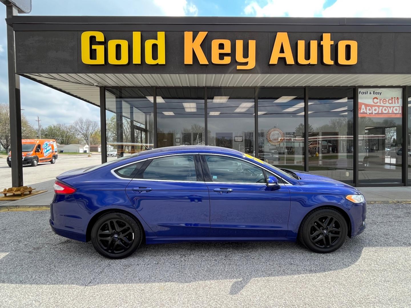 2014 Deep Impact Blue Ford Fusion SE (1FA6P0HD9E5) with an 1.5L L4 DOHC 16V engine, located at 1633 W Kimberly, Davenport, IA, 52806, (563) 323-5341, 41.559456, -90.598732 - Photo#0