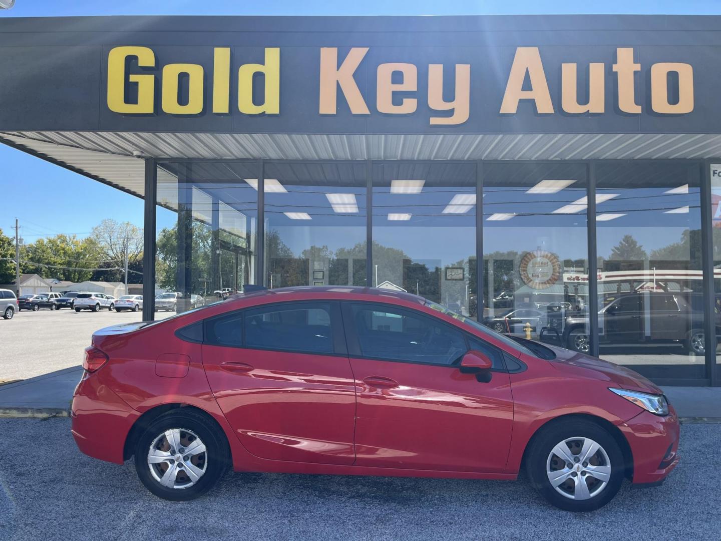 2018 Red Chevrolet Cruze LS Auto (1G1BC5SM8J7) with an 1.4L L4 DOHC 16V TUR engine, 6-Speed Automatic transmission, located at 1633 W Kimberly, Davenport, IA, 52806, (563) 323-5341, 41.559456, -90.598732 - Photo#0