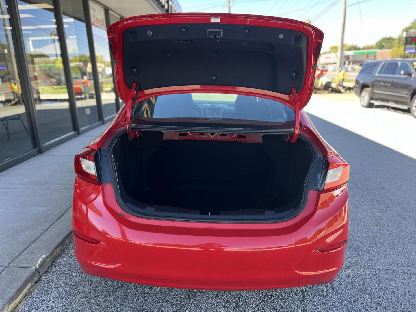 2018 Red Chevrolet Cruze LS Auto (1G1BC5SM8J7) with an 1.4L L4 DOHC 16V TUR engine, 6-Speed Automatic transmission, located at 1633 W Kimberly, Davenport, IA, 52806, (563) 323-5341, 41.559456, -90.598732 - Photo#5