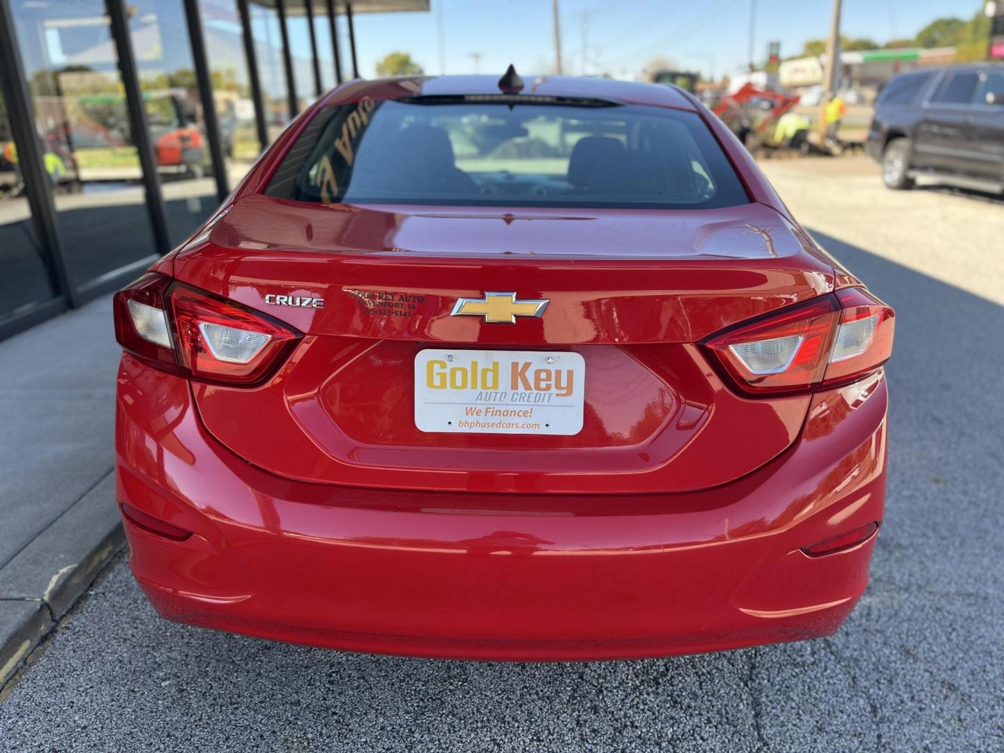 2018 Red Chevrolet Cruze LS Auto (1G1BC5SM8J7) with an 1.4L L4 DOHC 16V TUR engine, 6-Speed Automatic transmission, located at 1633 W Kimberly, Davenport, IA, 52806, (563) 323-5341, 41.559456, -90.598732 - Photo#4