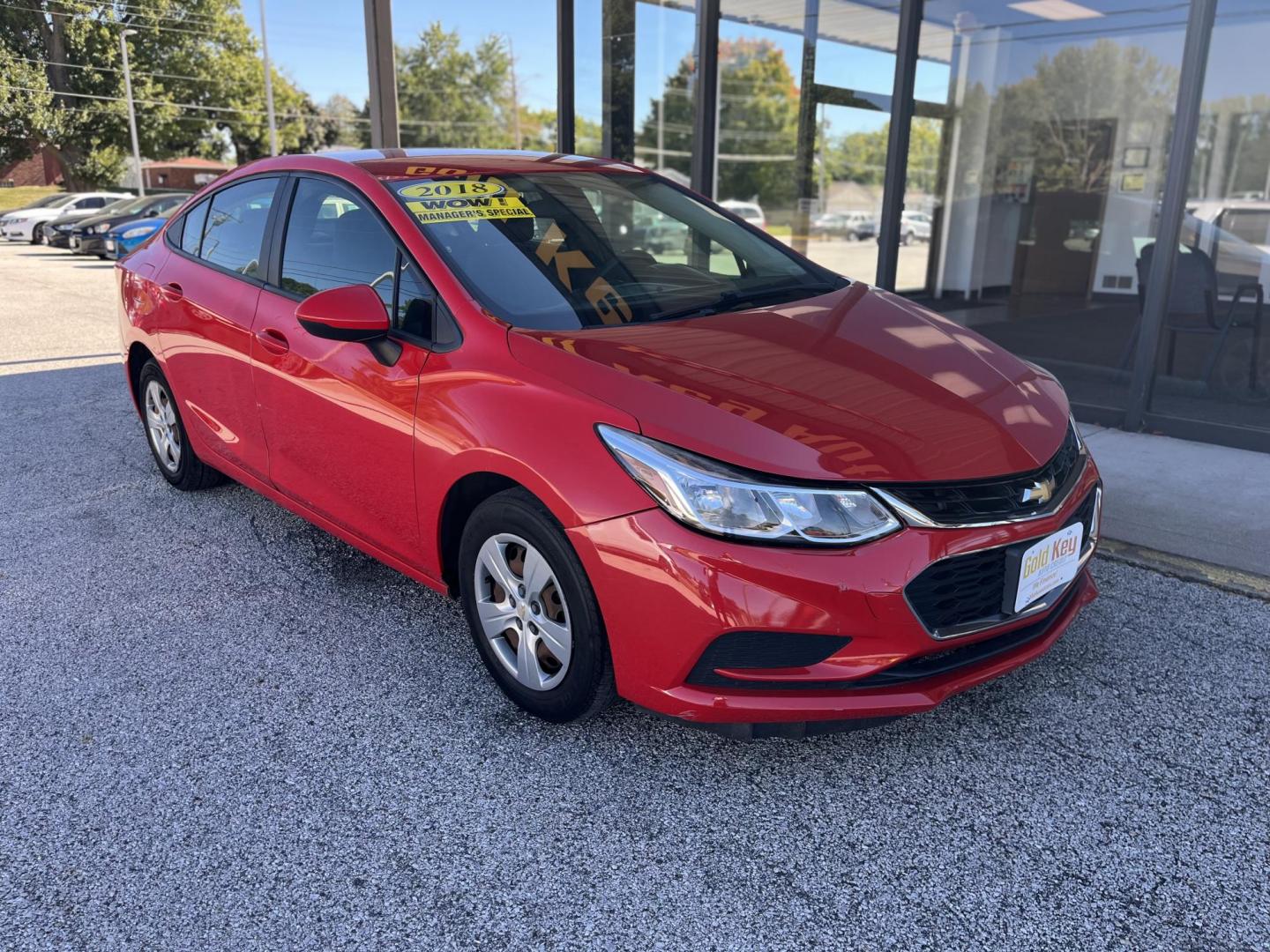 2018 Red Chevrolet Cruze LS Auto (1G1BC5SM8J7) with an 1.4L L4 DOHC 16V TUR engine, 6-Speed Automatic transmission, located at 1633 W Kimberly, Davenport, IA, 52806, (563) 323-5341, 41.559456, -90.598732 - Photo#2