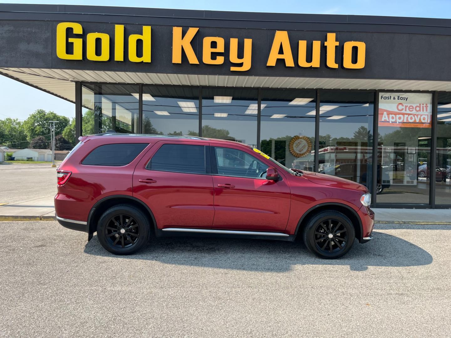 2014 Dp Cherry Red Crystal PC /Black Dodge Durango SXT AWD (1C4RDJAG9EC) with an 3.6L V6 DOHC 24V engine, 8-Speed Automatic transmission, located at 1633 W Kimberly, Davenport, IA, 52806, (563) 323-5341, 41.559456, -90.598732 - Photo#0