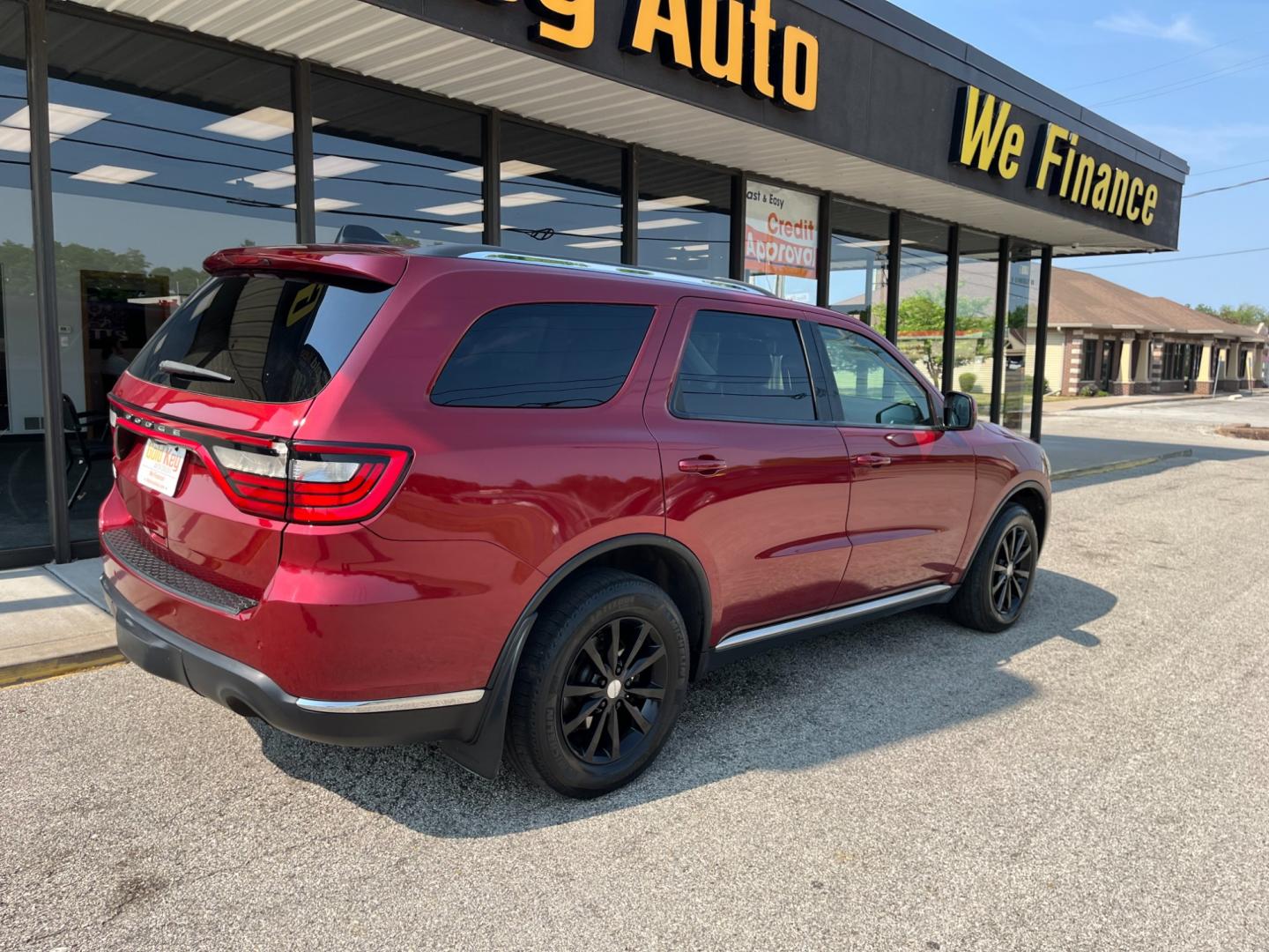 2014 Dp Cherry Red Crystal PC /Black Dodge Durango SXT AWD (1C4RDJAG9EC) with an 3.6L V6 DOHC 24V engine, 8-Speed Automatic transmission, located at 1633 W Kimberly, Davenport, IA, 52806, (563) 323-5341, 41.559456, -90.598732 - Photo#4