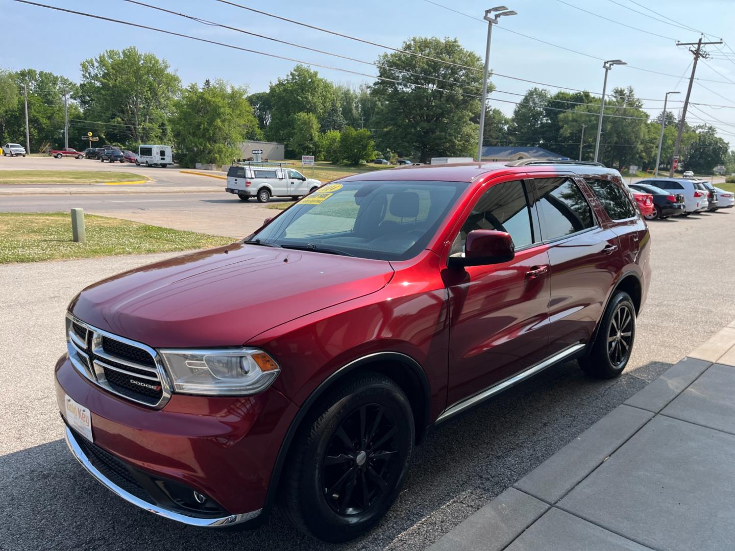 2014 Dp Cherry Red Crystal PC /Black Dodge Durango SXT AWD (1C4RDJAG9EC) with an 3.6L V6 DOHC 24V engine, 8-Speed Automatic transmission, located at 1633 W Kimberly, Davenport, IA, 52806, (563) 323-5341, 41.559456, -90.598732 - Photo#5