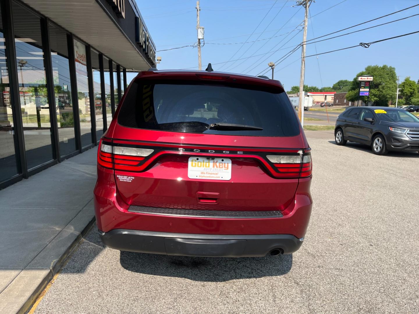 2014 Dp Cherry Red Crystal PC /Black Dodge Durango SXT AWD (1C4RDJAG9EC) with an 3.6L V6 DOHC 24V engine, 8-Speed Automatic transmission, located at 1633 W Kimberly, Davenport, IA, 52806, (563) 323-5341, 41.559456, -90.598732 - Photo#2