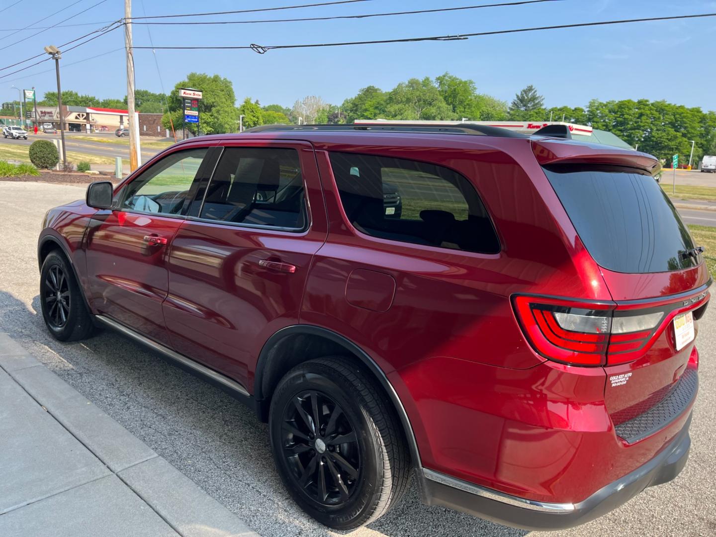 2014 Dp Cherry Red Crystal PC /Black Dodge Durango SXT AWD (1C4RDJAG9EC) with an 3.6L V6 DOHC 24V engine, 8-Speed Automatic transmission, located at 1633 W Kimberly, Davenport, IA, 52806, (563) 323-5341, 41.559456, -90.598732 - Photo#3