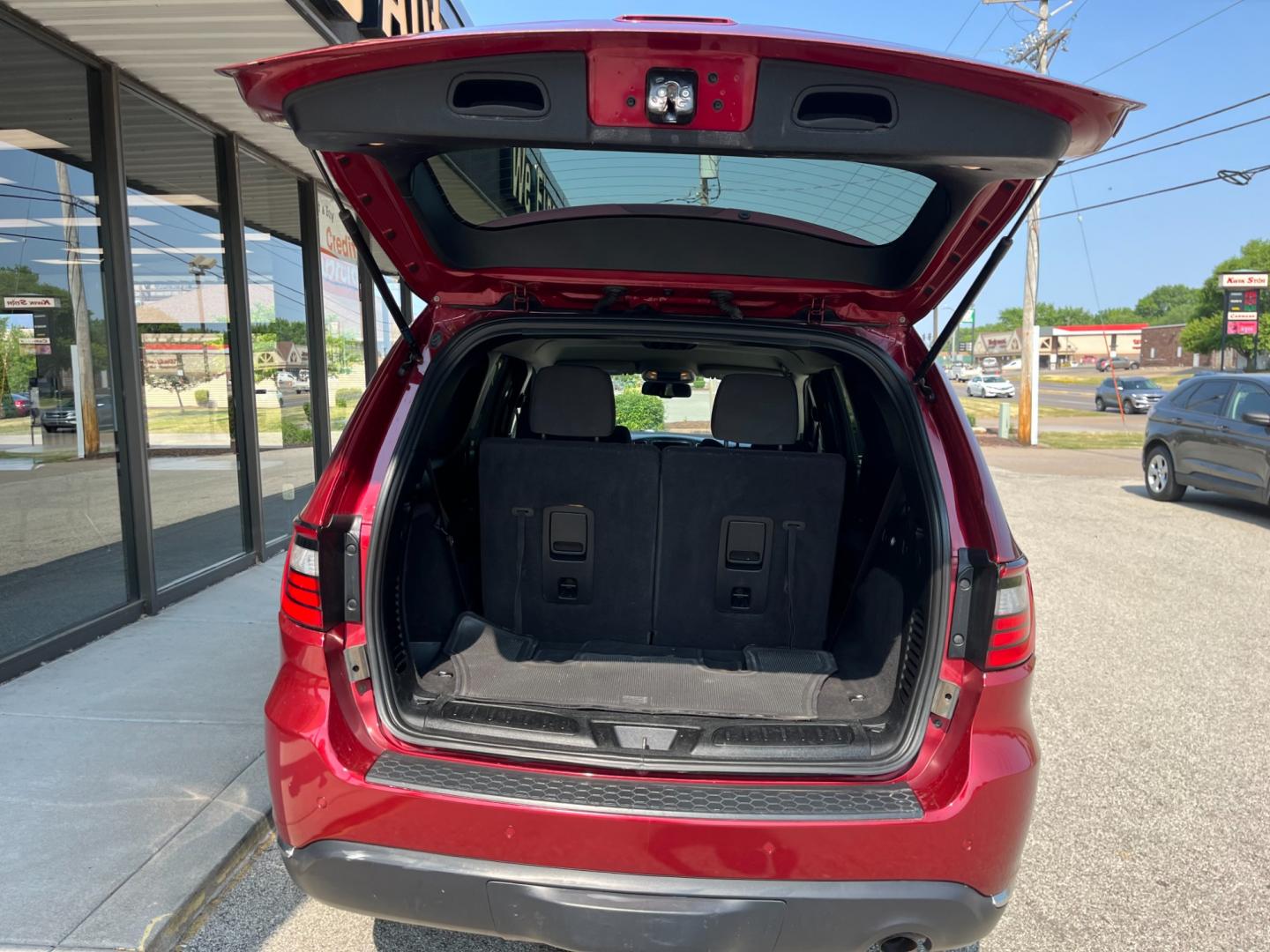 2014 Dp Cherry Red Crystal PC /Black Dodge Durango SXT AWD (1C4RDJAG9EC) with an 3.6L V6 DOHC 24V engine, 8-Speed Automatic transmission, located at 1633 W Kimberly, Davenport, IA, 52806, (563) 323-5341, 41.559456, -90.598732 - Photo#6