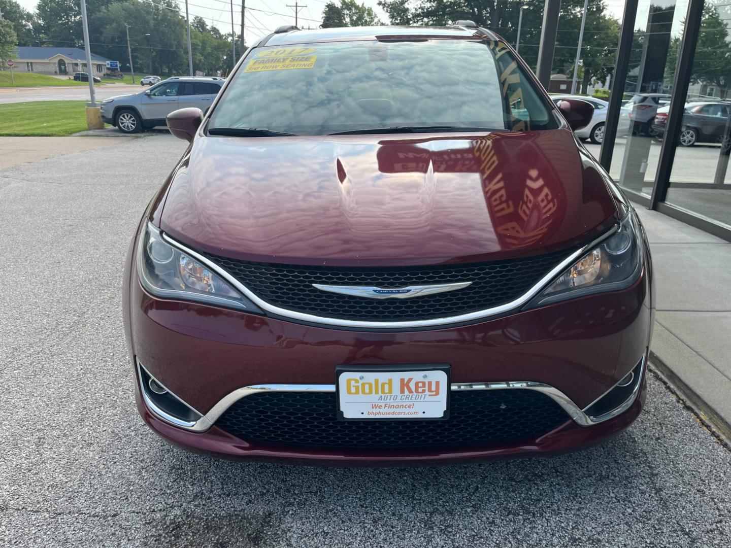 2017 Velvet Red Pearl Coat Chrysler Pacifica Touring-L (2C4RC1BG7HR) with an 3.6L V6 DOHC 24V engine, 9-Speed Automatic transmission, located at 1633 W Kimberly, Davenport, IA, 52806, (563) 323-5341, 41.559456, -90.598732 - Photo#1