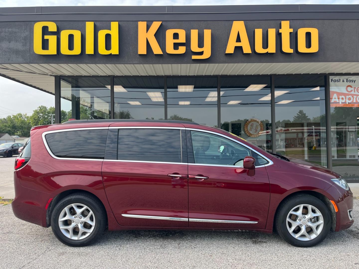 2017 Velvet Red Pearl Coat Chrysler Pacifica Touring-L (2C4RC1BG7HR) with an 3.6L V6 DOHC 24V engine, 9-Speed Automatic transmission, located at 1633 W Kimberly, Davenport, IA, 52806, (563) 323-5341, 41.559456, -90.598732 - Photo#0