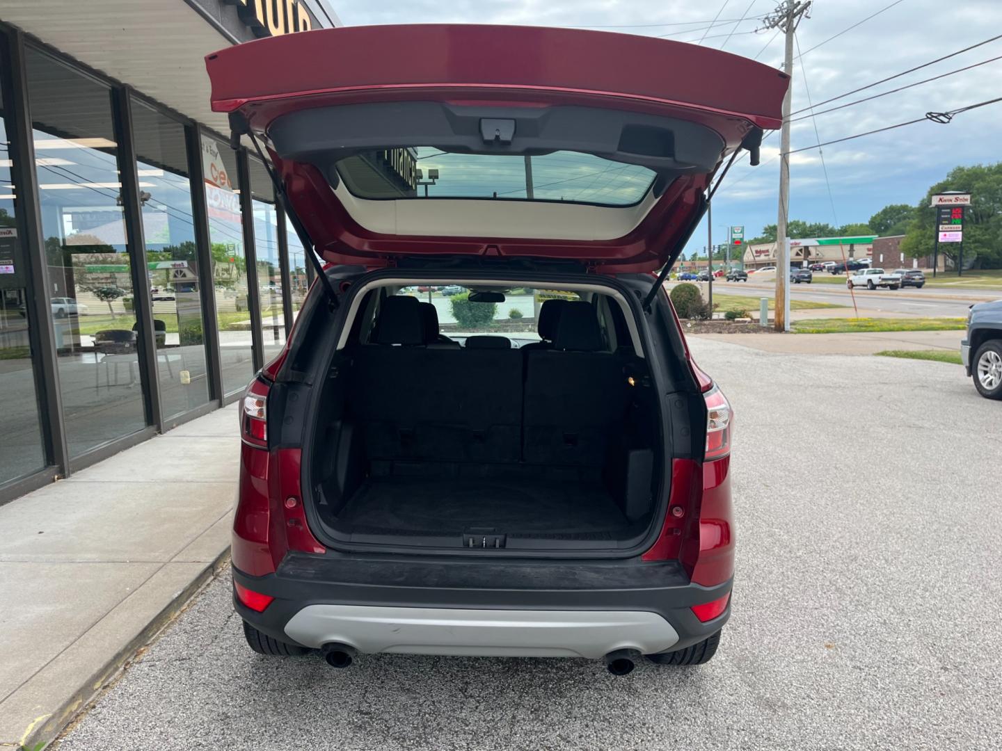 2018 Ruby Red Metallic Tinted Clearcoat Ford Escape SE FWD (1FMCU0GD1JU) with an 1.5L L4 DOHC 16V engine, 6-Speed Automatic transmission, located at 1633 W Kimberly, Davenport, IA, 52806, (563) 323-5341, 41.559456, -90.598732 - Photo#5