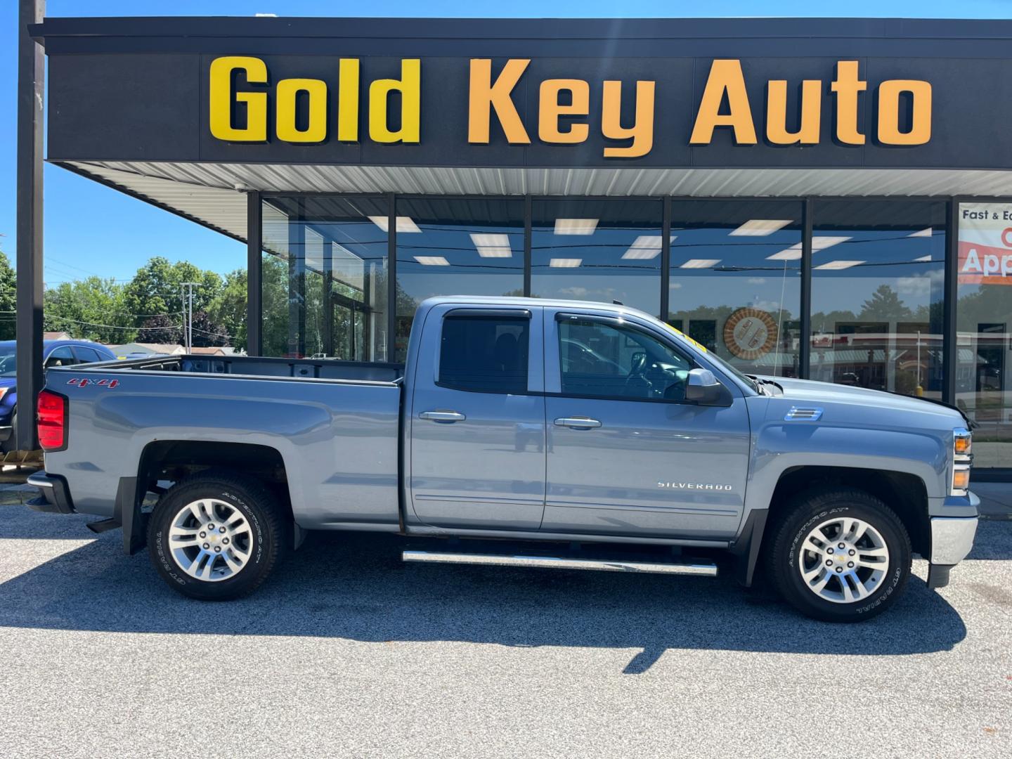 2015 Blue Chevrolet Silverado 1500 LT Double Cab 4WD (1GCVKREC4FZ) with an 5.3L V8 OHV 16V engine, 6-Speed Automatic transmission, located at 1633 W Kimberly, Davenport, IA, 52806, (563) 323-5341, 41.559456, -90.598732 - Photo#0