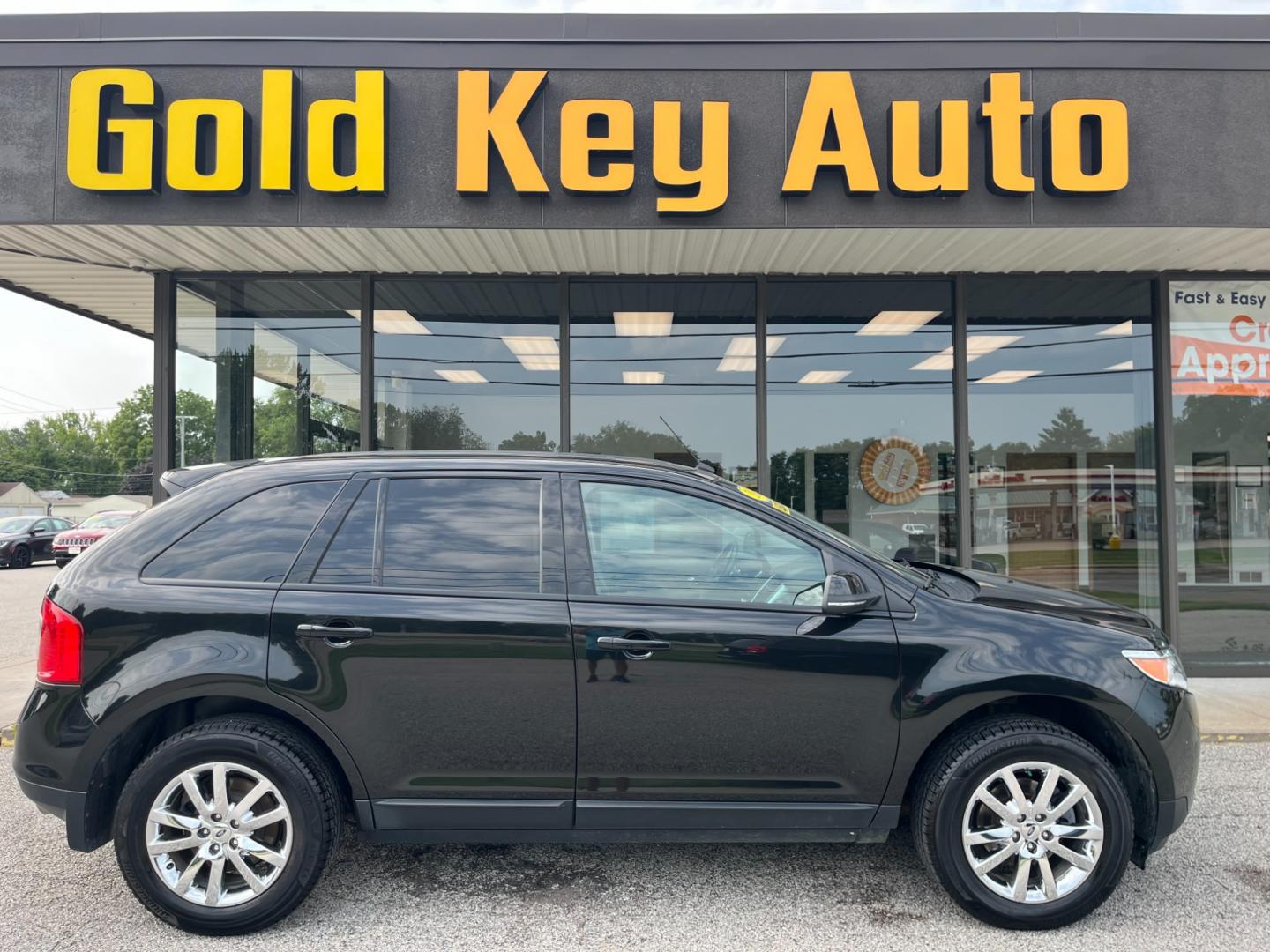 2013 Black Ford Edge (2FMDK3JC9DB) , located at 1633 W Kimberly, Davenport, IA, 52806, (563) 323-5341, 41.559456, -90.598732 - Photo#0