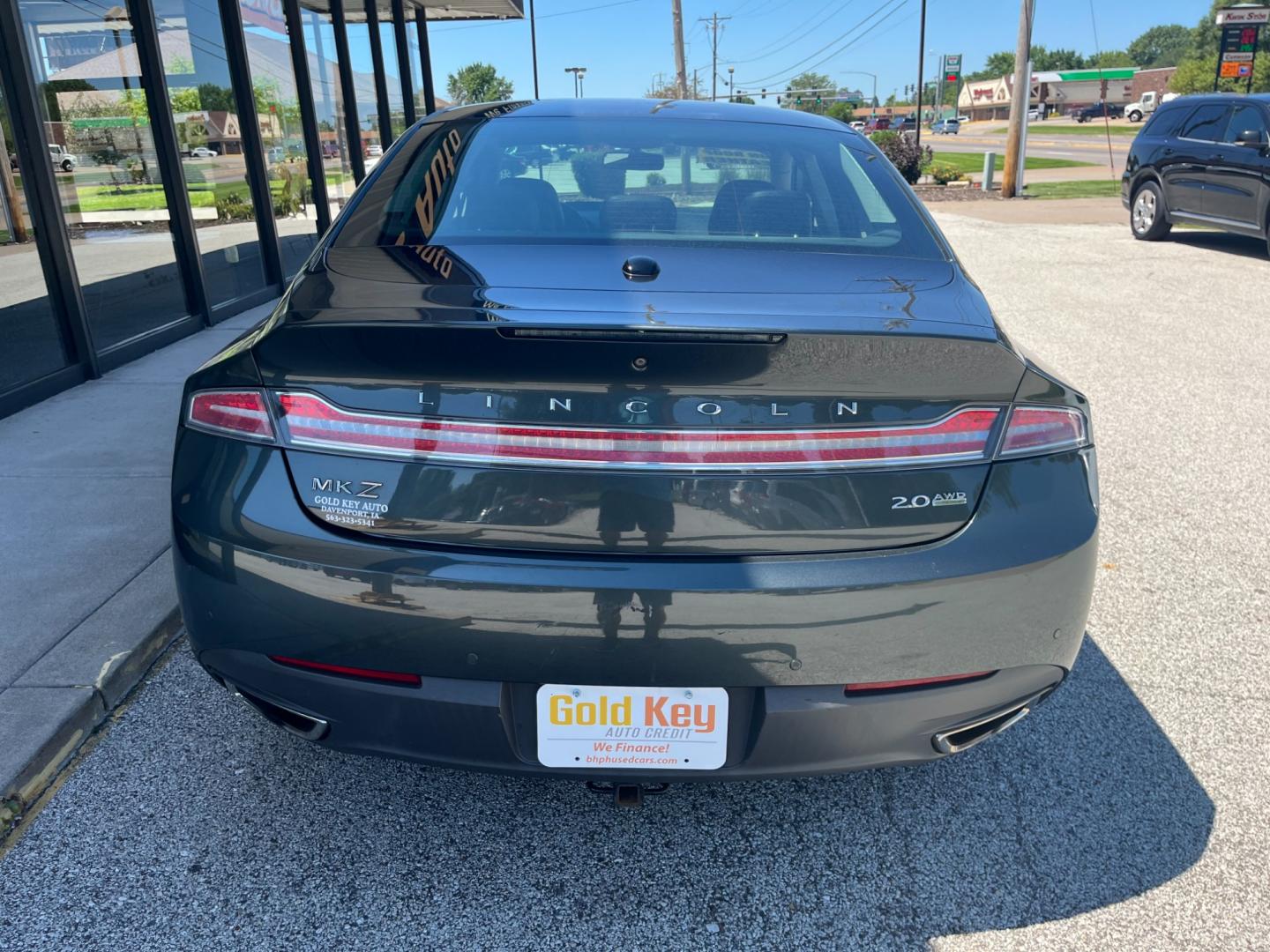 2016 Gray Lincoln MKZ AWD (3LN6L2J95GR) with an 2.0L L4 DOHC 16V engine, 6-Speed Automatic transmission, located at 1633 W Kimberly, Davenport, IA, 52806, (563) 323-5341, 41.559456, -90.598732 - Photo#4