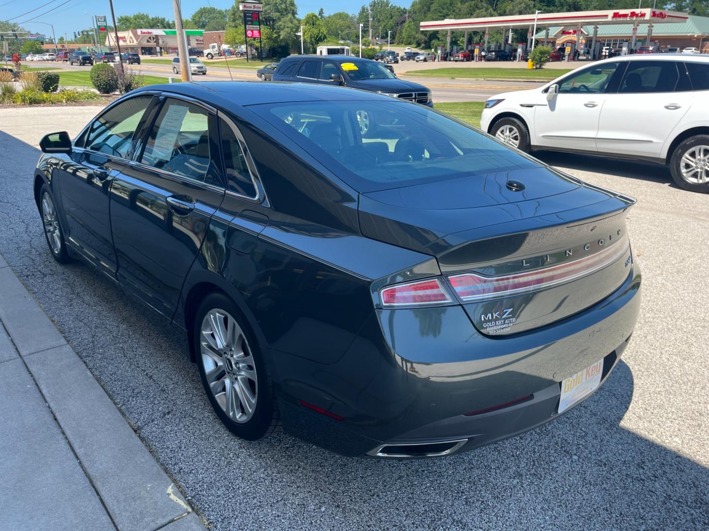 2016 Gray Lincoln MKZ AWD (3LN6L2J95GR) with an 2.0L L4 DOHC 16V engine, 6-Speed Automatic transmission, located at 1633 W Kimberly, Davenport, IA, 52806, (563) 323-5341, 41.559456, -90.598732 - Photo#3