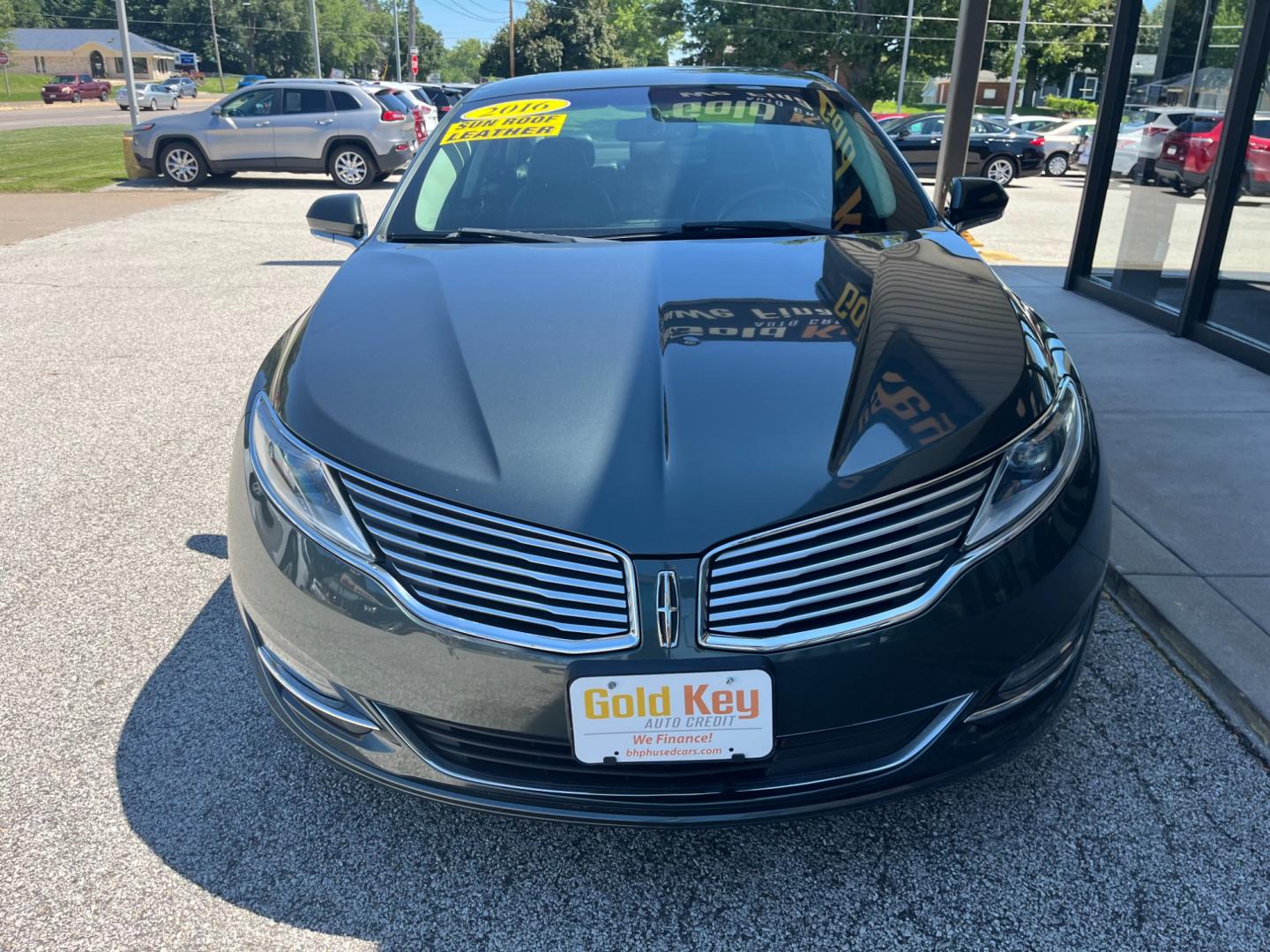 2016 Gray Lincoln MKZ AWD (3LN6L2J95GR) with an 2.0L L4 DOHC 16V engine, 6-Speed Automatic transmission, located at 1633 W Kimberly, Davenport, IA, 52806, (563) 323-5341, 41.559456, -90.598732 - Photo#1