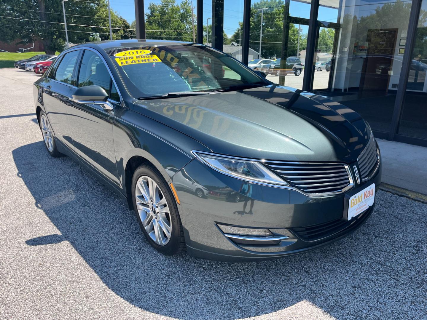 2016 Gray Lincoln MKZ AWD (3LN6L2J95GR) with an 2.0L L4 DOHC 16V engine, 6-Speed Automatic transmission, located at 1633 W Kimberly, Davenport, IA, 52806, (563) 323-5341, 41.559456, -90.598732 - Photo#2