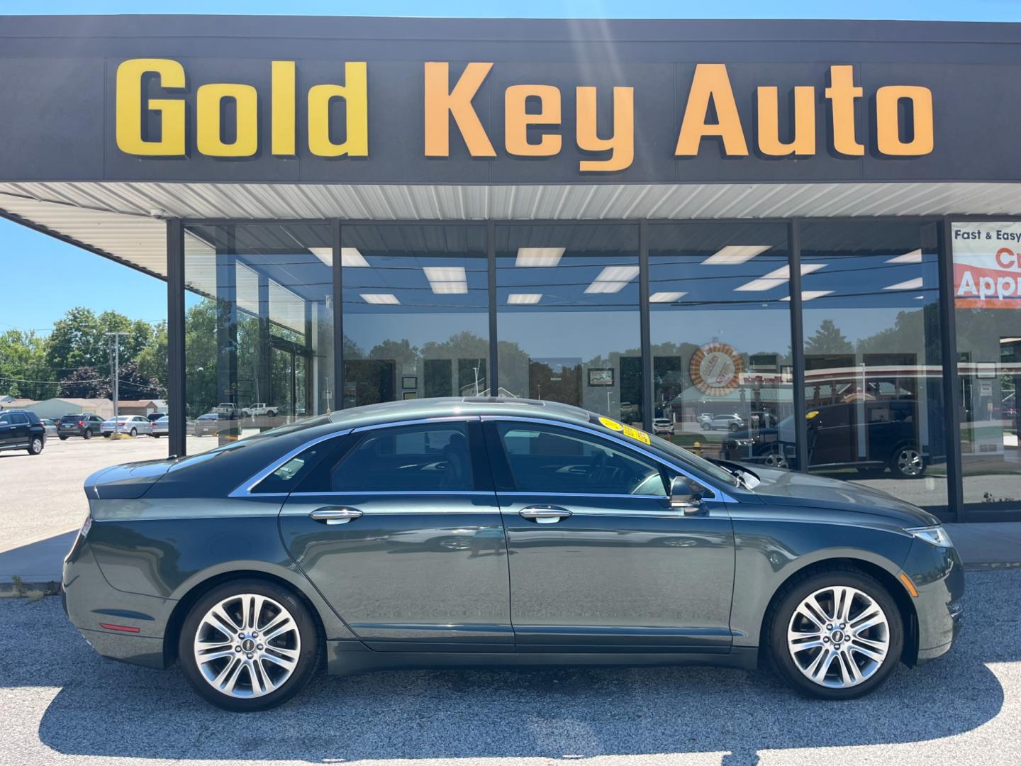 2016 Gray Lincoln MKZ AWD (3LN6L2J95GR) with an 2.0L L4 DOHC 16V engine, 6-Speed Automatic transmission, located at 1633 W Kimberly, Davenport, IA, 52806, (563) 323-5341, 41.559456, -90.598732 - Photo#0