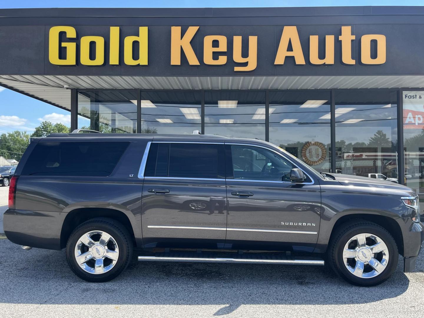 2017 Tungsten Metallic Chevrolet Suburban LT 4WD (1GNSKHKC0HR) with an 5.3L V8 OHV 16V engine, 6-Speed Automatic transmission, located at 1633 W Kimberly, Davenport, IA, 52806, (563) 323-5341, 41.559456, -90.598732 - Photo#0