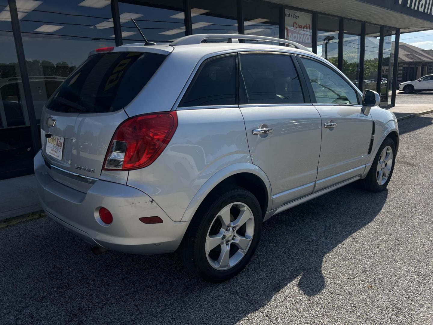 2015 Silver Chevrolet Captiva Sport 1LT FWD (3GNAL3EK5FS) with an 2.4L L4 DOHC 16V FFV engine, 6-Speed Automatic transmission, located at 1633 W Kimberly, Davenport, IA, 52806, (563) 323-5341, 41.559456, -90.598732 - Photo#3