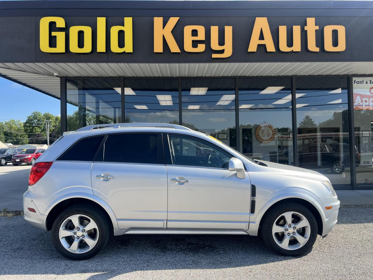 2015 Silver Chevrolet Captiva Sport 1LT FWD (3GNAL3EK5FS) with an 2.4L L4 DOHC 16V FFV engine, 6-Speed Automatic transmission, located at 1633 W Kimberly, Davenport, IA, 52806, (563) 323-5341, 41.559456, -90.598732 - Photo#0