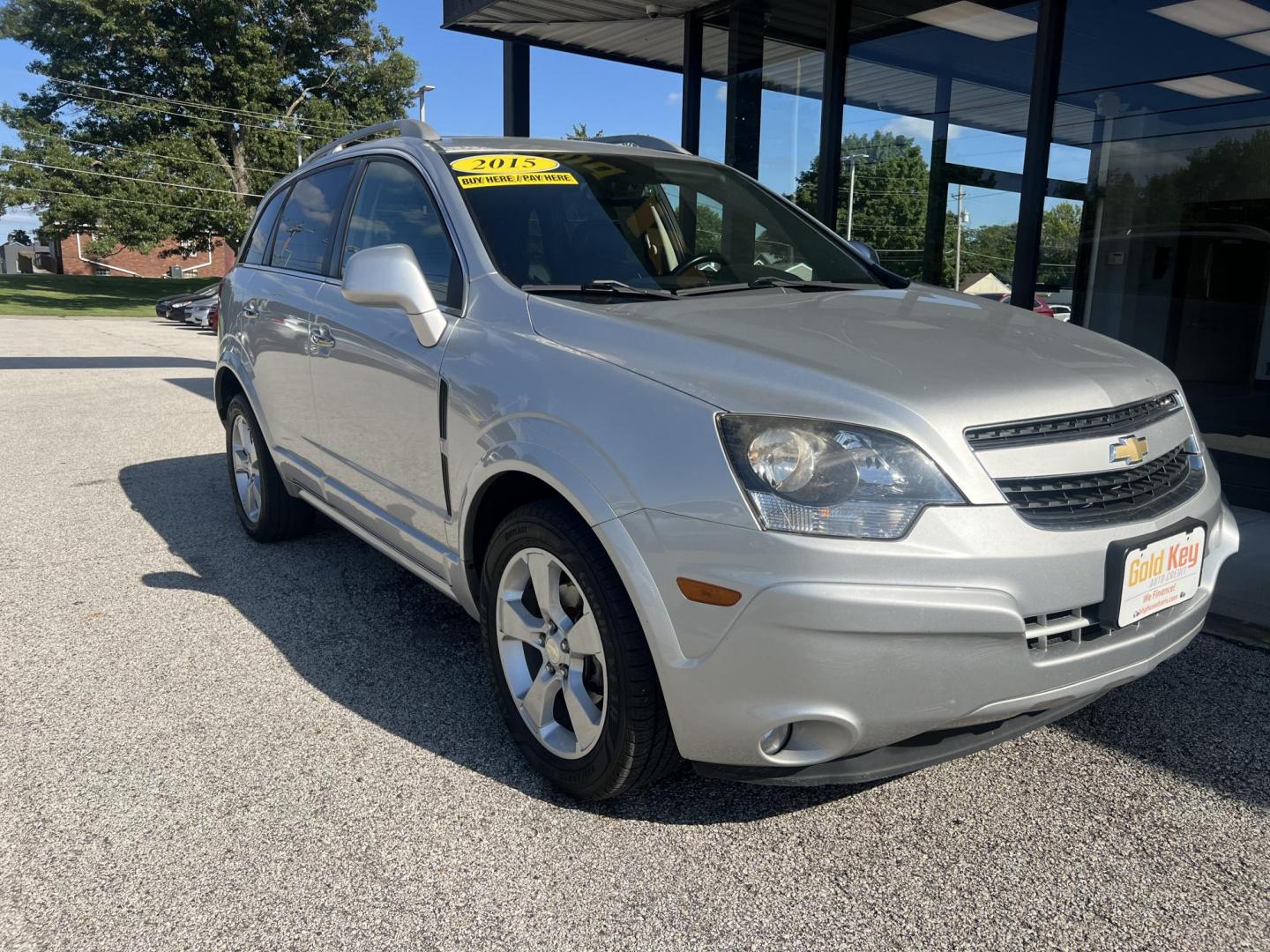 2015 Silver Chevrolet Captiva Sport 1LT FWD (3GNAL3EK5FS) with an 2.4L L4 DOHC 16V FFV engine, 6-Speed Automatic transmission, located at 1633 W Kimberly, Davenport, IA, 52806, (563) 323-5341, 41.559456, -90.598732 - Photo#1