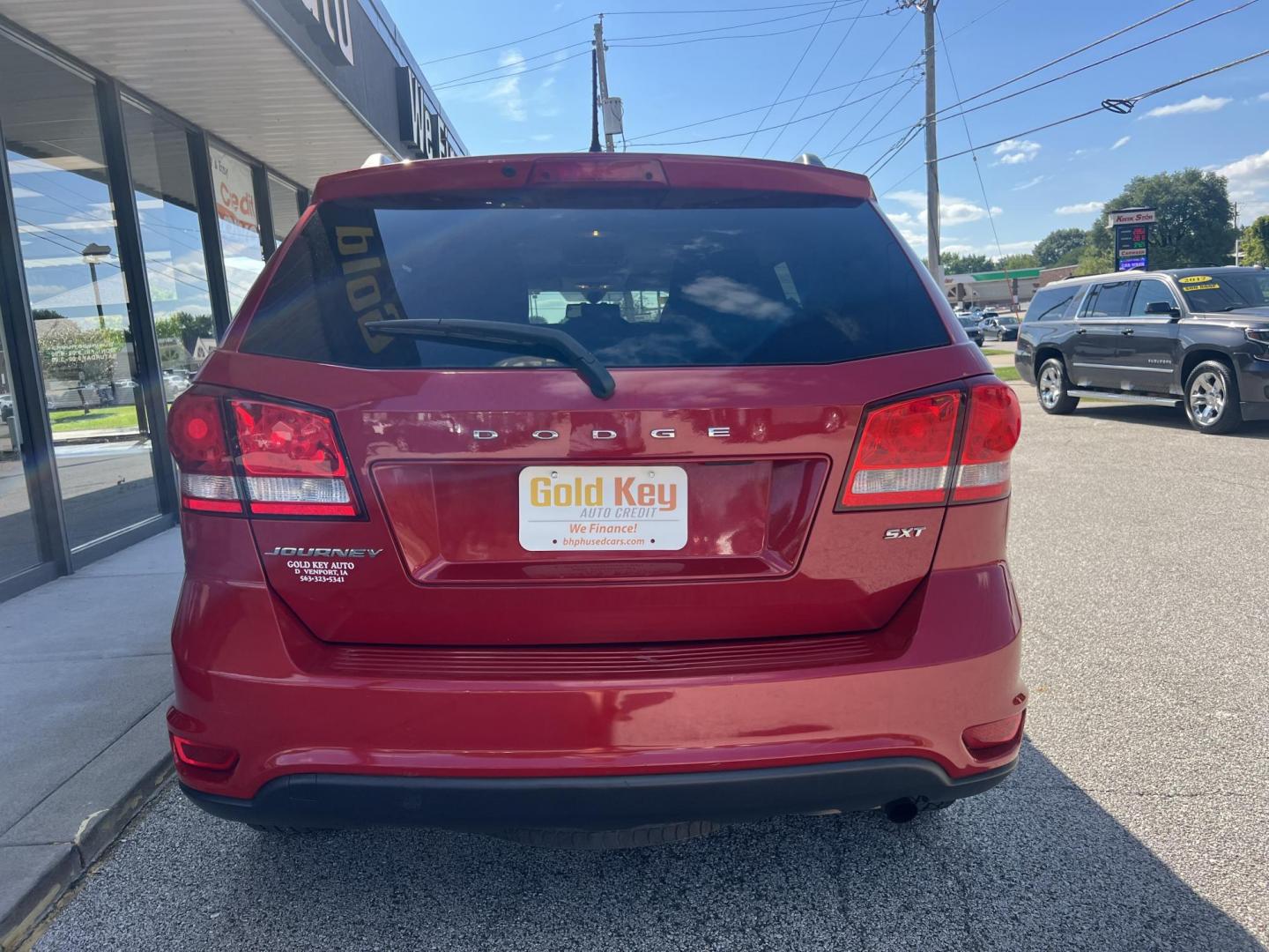 2016 Redline Pearl Coat /Black Dodge Journey SXT (3C4PDCBBXGT) with an 2.4L L6 DOHC 16V engine, 4A transmission, located at 1633 W Kimberly, Davenport, IA, 52806, (563) 323-5341, 41.559456, -90.598732 - Photo#4