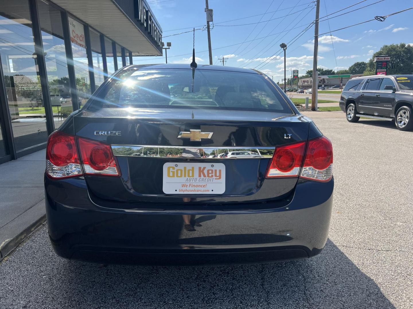 2014 Black /Gray Chevrolet Cruze 1LT Auto (1G1PC5SB5E7) with an 1.4L L4 DOHC 16V TURBO engine, 6-Speed Automatic transmission, located at 1633 W Kimberly, Davenport, IA, 52806, (563) 323-5341, 41.559456, -90.598732 - Photo#4