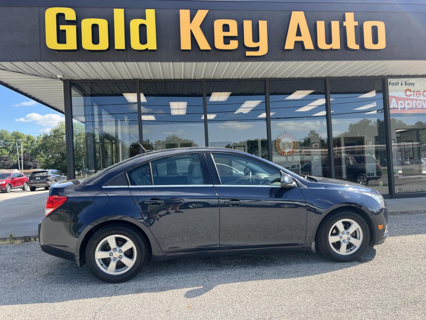 2014 Black /Gray Chevrolet Cruze 1LT Auto (1G1PC5SB5E7) with an 1.4L L4 DOHC 16V TURBO engine, 6-Speed Automatic transmission, located at 1633 W Kimberly, Davenport, IA, 52806, (563) 323-5341, 41.559456, -90.598732 - Photo#0