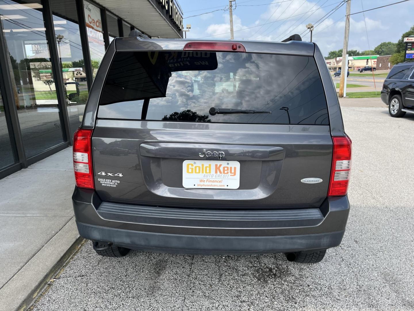 2014 Granite Crystal Met CC Jeep Patriot Latitude 4WD (1C4NJRFB8ED) with an 2.4L L4 DOHC 16V engine, located at 1633 W Kimberly, Davenport, IA, 52806, (563) 323-5341, 41.559456, -90.598732 - Photo#4