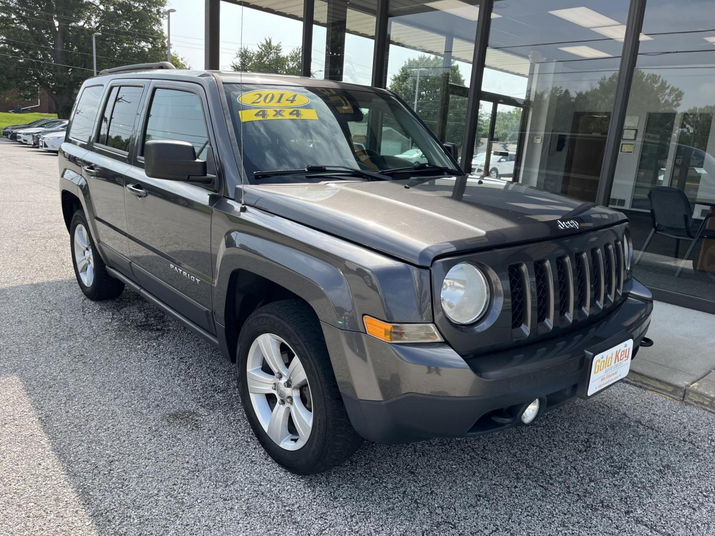 2014 Granite Crystal Met CC Jeep Patriot Latitude 4WD (1C4NJRFB8ED) with an 2.4L L4 DOHC 16V engine, located at 1633 W Kimberly, Davenport, IA, 52806, (563) 323-5341, 41.559456, -90.598732 - Photo#2