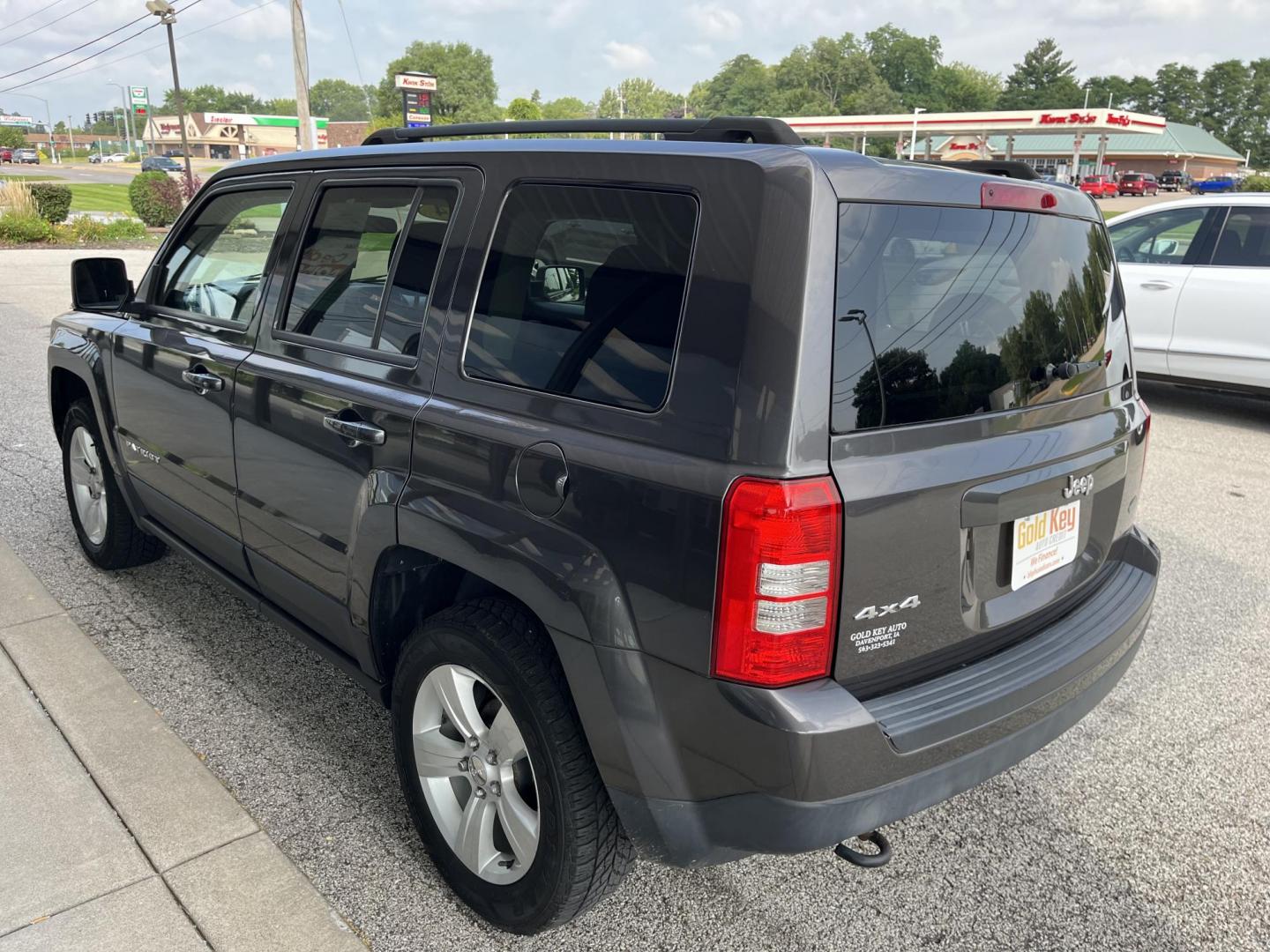 2014 Granite Crystal Met CC Jeep Patriot Latitude 4WD (1C4NJRFB8ED) with an 2.4L L4 DOHC 16V engine, located at 1633 W Kimberly, Davenport, IA, 52806, (563) 323-5341, 41.559456, -90.598732 - Photo#3