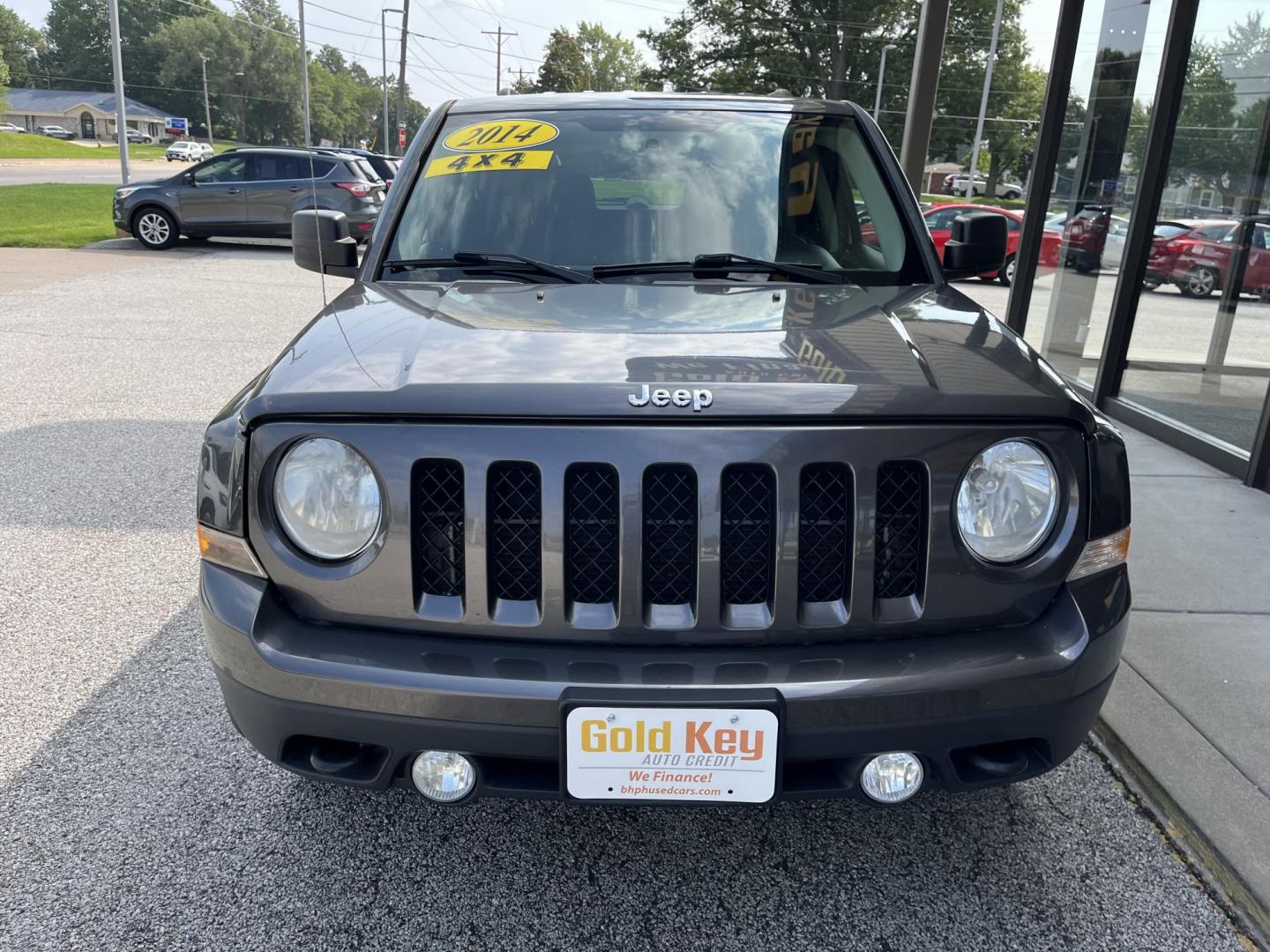 2014 Granite Crystal Met CC Jeep Patriot Latitude 4WD (1C4NJRFB8ED) with an 2.4L L4 DOHC 16V engine, located at 1633 W Kimberly, Davenport, IA, 52806, (563) 323-5341, 41.559456, -90.598732 - Photo#1