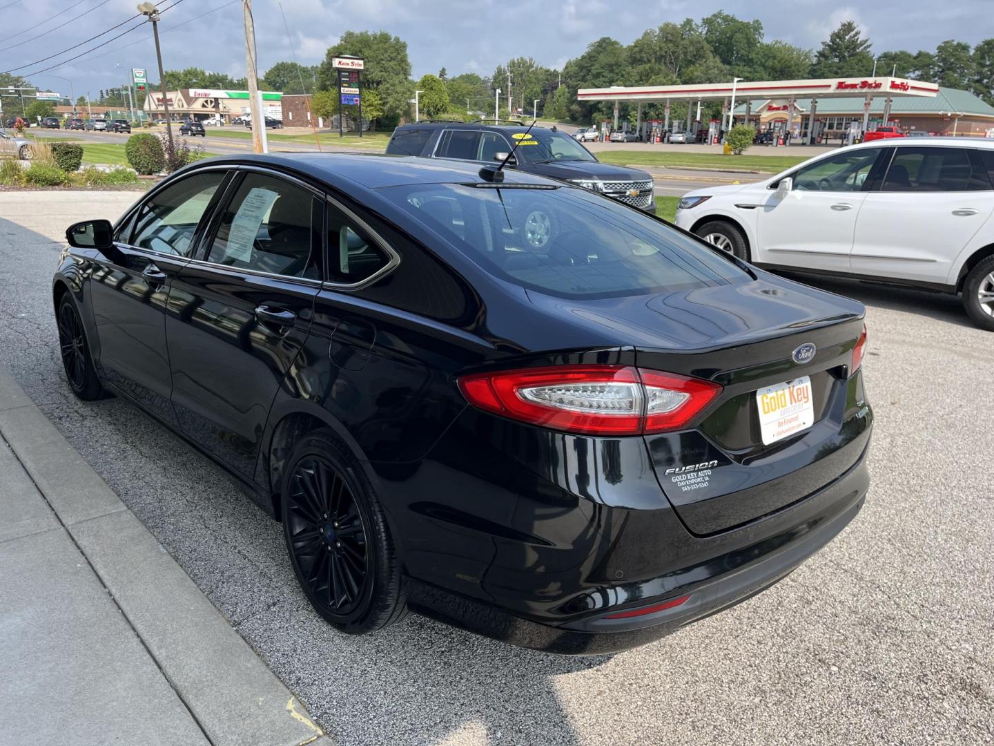 2014 Tuxedo Black Metallic Ford Fusion SE (3FA6P0HD2ER) with an 1.5L L4 DOHC 16V engine, located at 1633 W Kimberly, Davenport, IA, 52806, (563) 323-5341, 41.559456, -90.598732 - Photo#3