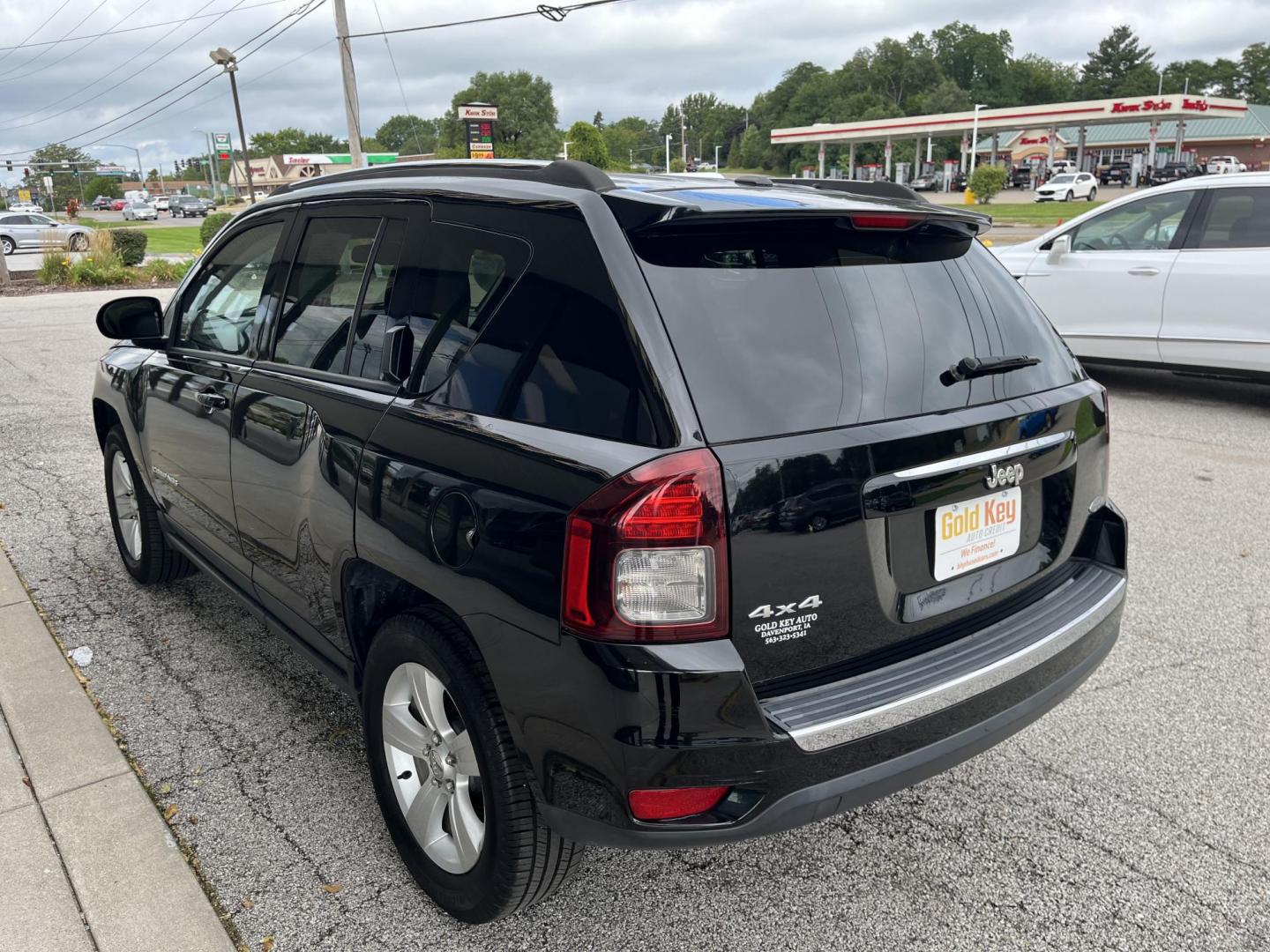 2015 Black Clear Coat Jeep Compass Latitude 4WD (1C4NJDEBXFD) with an 2.4L L4 DOHC 16V engine, 6-Speed Automatic transmission, located at 1633 W Kimberly, Davenport, IA, 52806, (563) 323-5341, 41.559456, -90.598732 - Photo#3