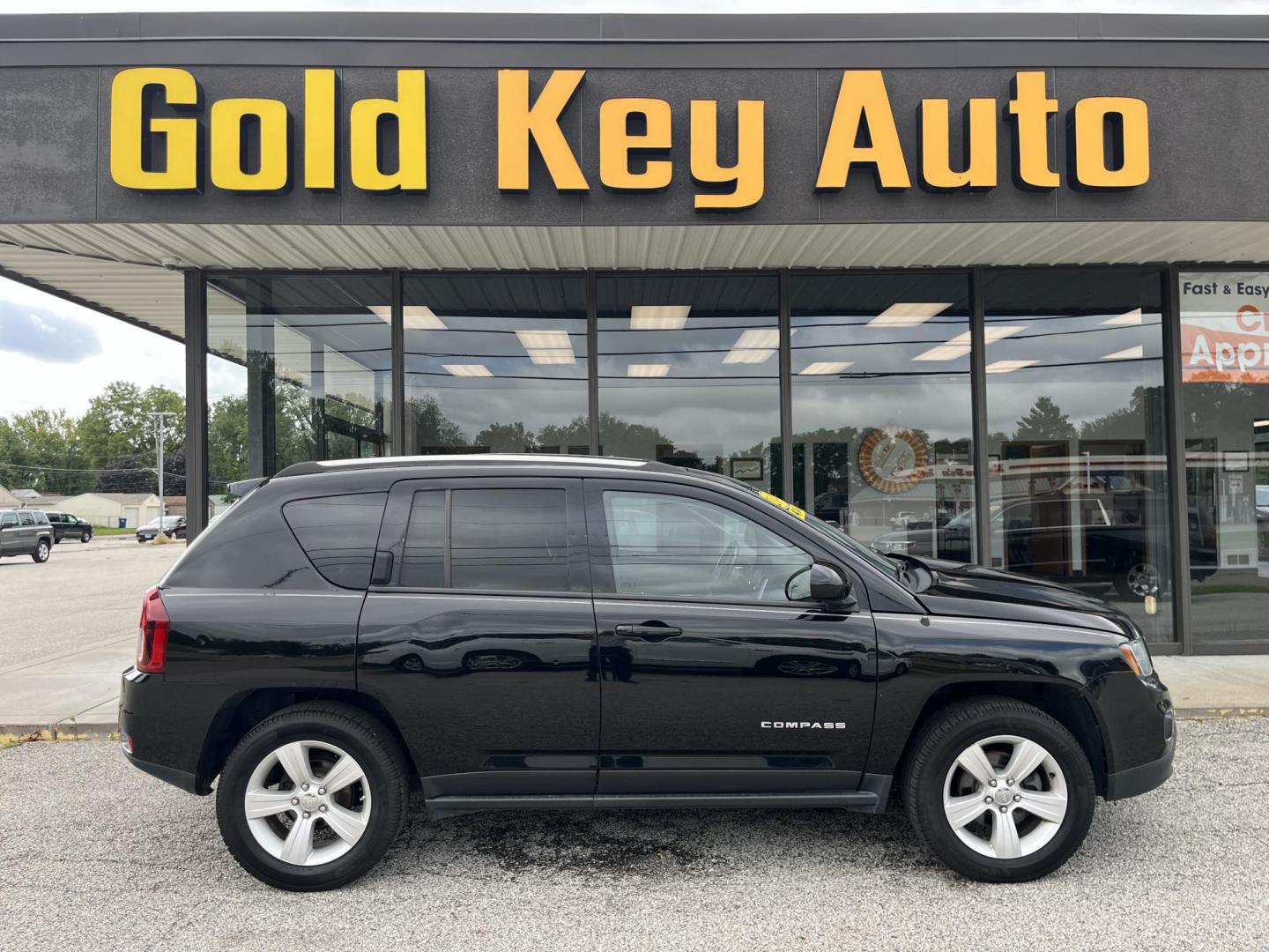 2015 Black Clear Coat Jeep Compass Latitude 4WD (1C4NJDEBXFD) with an 2.4L L4 DOHC 16V engine, 6-Speed Automatic transmission, located at 1633 W Kimberly, Davenport, IA, 52806, (563) 323-5341, 41.559456, -90.598732 - Photo#0