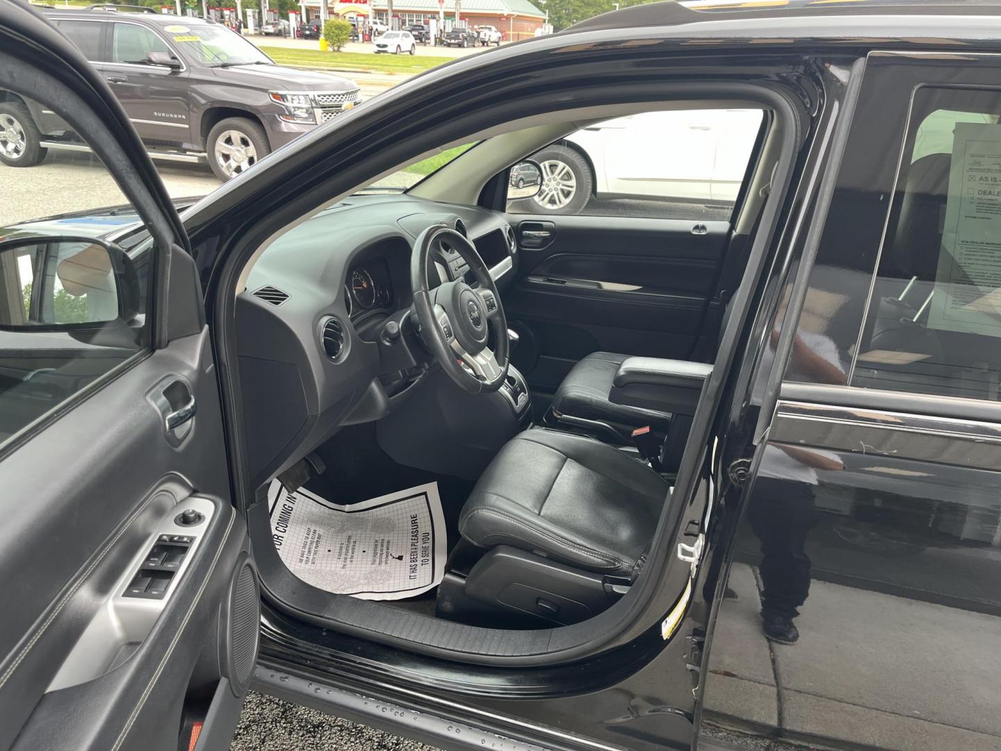 2015 Black Clear Coat Jeep Compass Latitude 4WD (1C4NJDEBXFD) with an 2.4L L4 DOHC 16V engine, 6-Speed Automatic transmission, located at 1633 W Kimberly, Davenport, IA, 52806, (563) 323-5341, 41.559456, -90.598732 - Photo#8