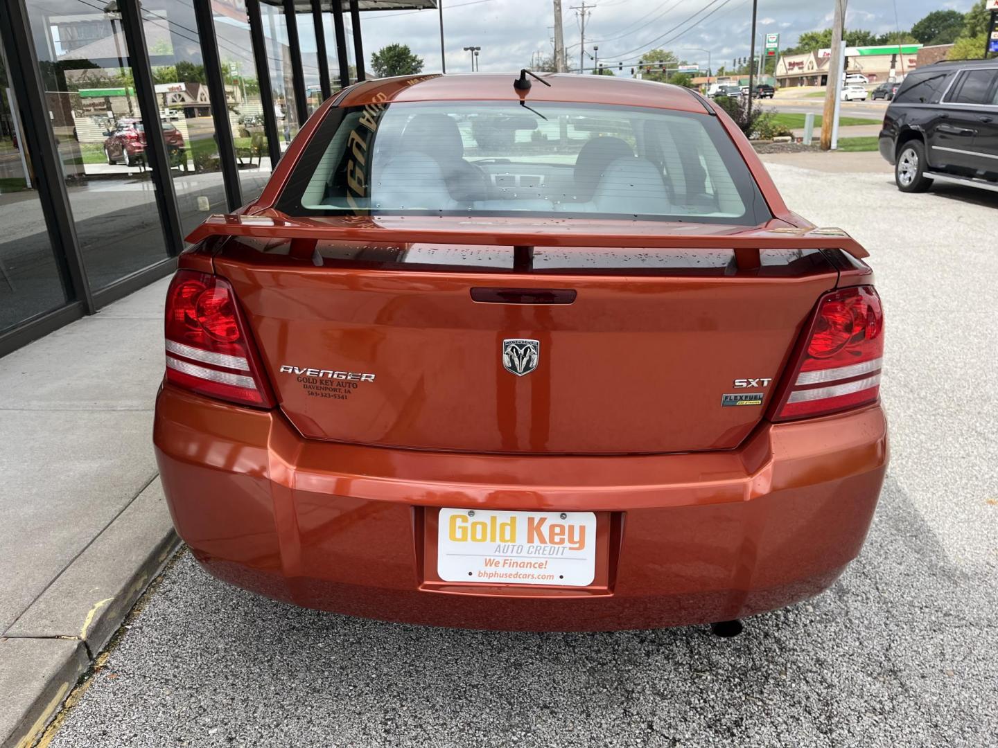 2008 Sunburst Orange Pearl Dodge Avenger SXT (1B3LC56R38N) with an 2.7L V6 DOHC 24V FFV engine, 4-Speed Automatic transmission, located at 1633 W Kimberly, Davenport, IA, 52806, (563) 323-5341, 41.559456, -90.598732 - Photo#4