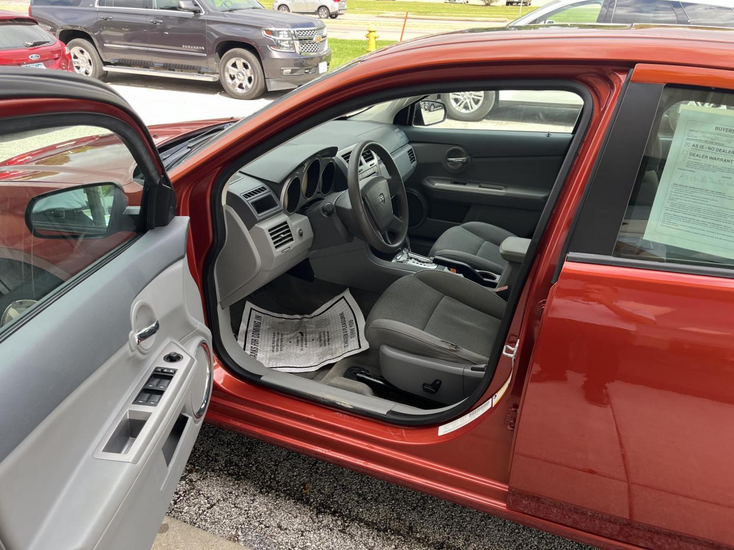 2008 Sunburst Orange Pearl Dodge Avenger SXT (1B3LC56R38N) with an 2.7L V6 DOHC 24V FFV engine, 4-Speed Automatic transmission, located at 1633 W Kimberly, Davenport, IA, 52806, (563) 323-5341, 41.559456, -90.598732 - Photo#8