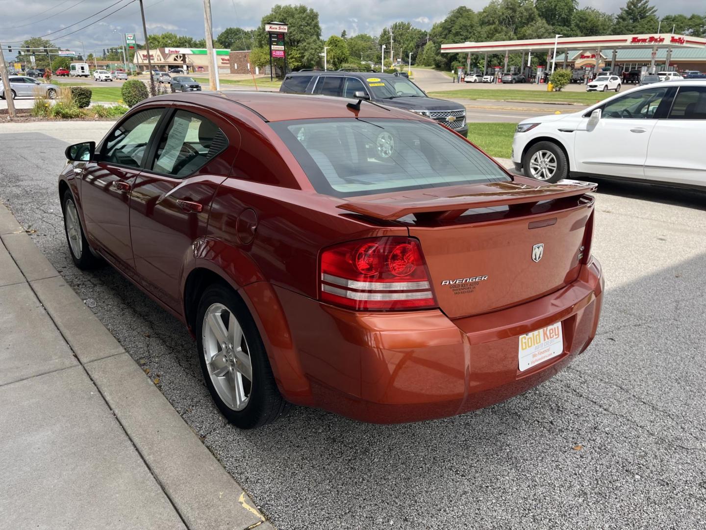 2008 Sunburst Orange Pearl Dodge Avenger SXT (1B3LC56R38N) with an 2.7L V6 DOHC 24V FFV engine, 4-Speed Automatic transmission, located at 1633 W Kimberly, Davenport, IA, 52806, (563) 323-5341, 41.559456, -90.598732 - Photo#3