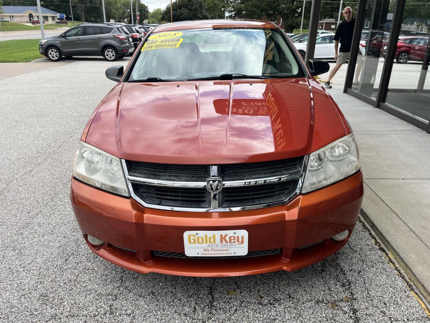 2008 Sunburst Orange Pearl Dodge Avenger SXT (1B3LC56R38N) with an 2.7L V6 DOHC 24V FFV engine, 4-Speed Automatic transmission, located at 1633 W Kimberly, Davenport, IA, 52806, (563) 323-5341, 41.559456, -90.598732 - Photo#1