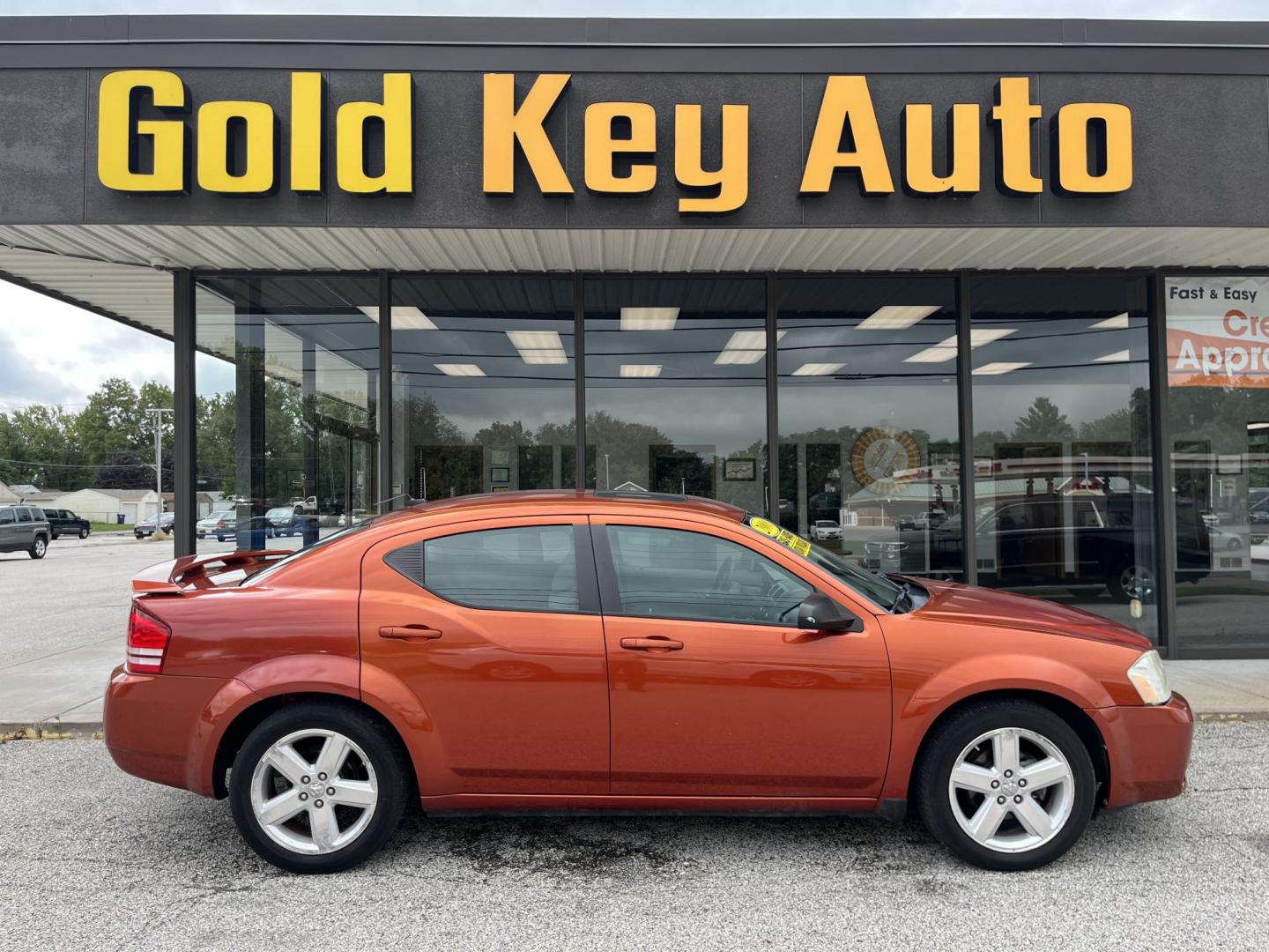 2008 Sunburst Orange Pearl Dodge Avenger SXT (1B3LC56R38N) with an 2.7L V6 DOHC 24V FFV engine, 4-Speed Automatic transmission, located at 1633 W Kimberly, Davenport, IA, 52806, (563) 323-5341, 41.559456, -90.598732 - Photo#0