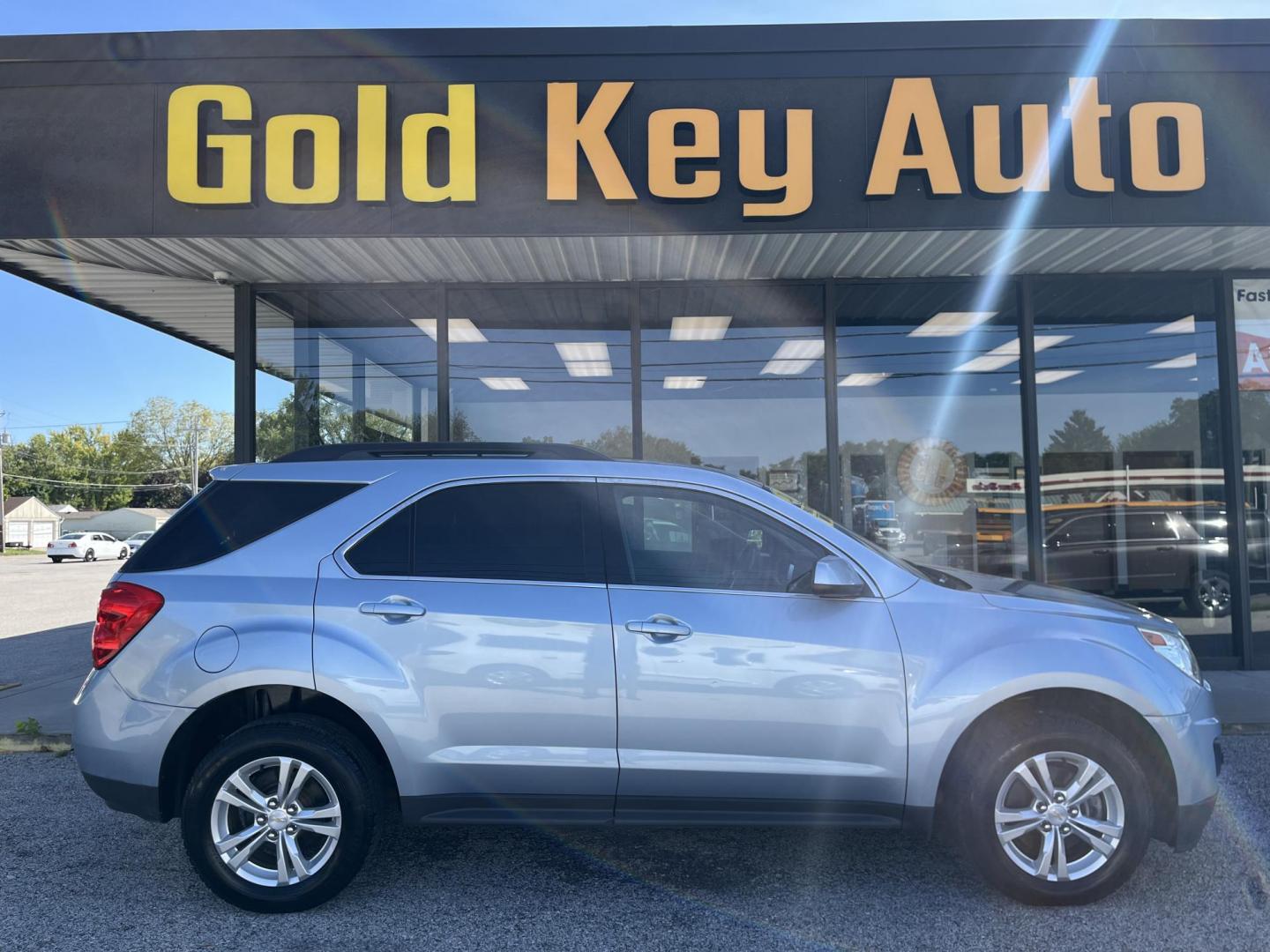 2014 Blue Candy Tinted CC Chevrolet Equinox 1LT 2WD (2GNALBEK6E6) with an 2.4L L4 DOHC 16V engine, 6-Speed Automatic transmission, located at 1633 W Kimberly, Davenport, IA, 52806, (563) 323-5341, 41.559456, -90.598732 - Photo#0