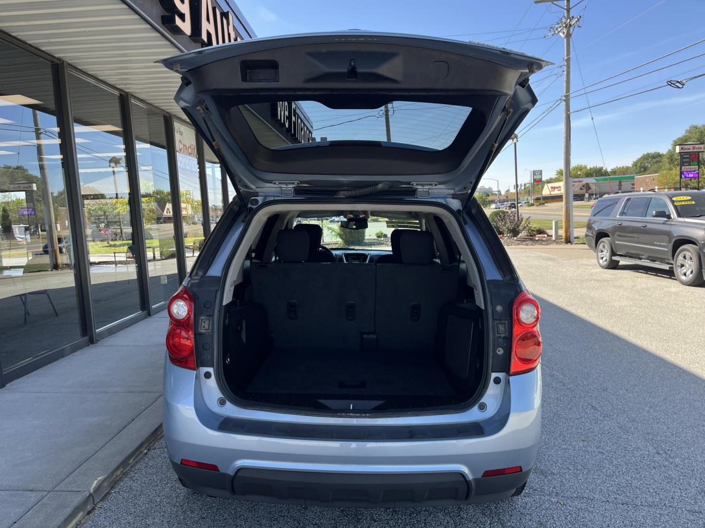 2014 Blue Candy Tinted CC Chevrolet Equinox 1LT 2WD (2GNALBEK6E6) with an 2.4L L4 DOHC 16V engine, 6-Speed Automatic transmission, located at 1633 W Kimberly, Davenport, IA, 52806, (563) 323-5341, 41.559456, -90.598732 - Photo#5