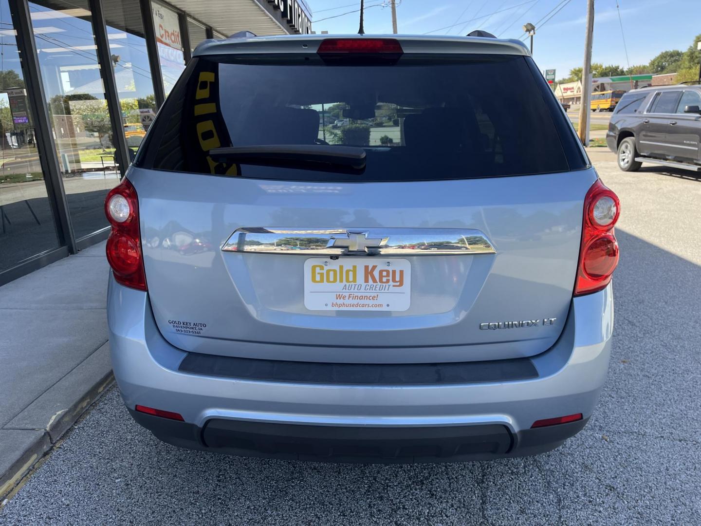 2014 Blue Candy Tinted CC Chevrolet Equinox 1LT 2WD (2GNALBEK6E6) with an 2.4L L4 DOHC 16V engine, 6-Speed Automatic transmission, located at 1633 W Kimberly, Davenport, IA, 52806, (563) 323-5341, 41.559456, -90.598732 - Photo#4