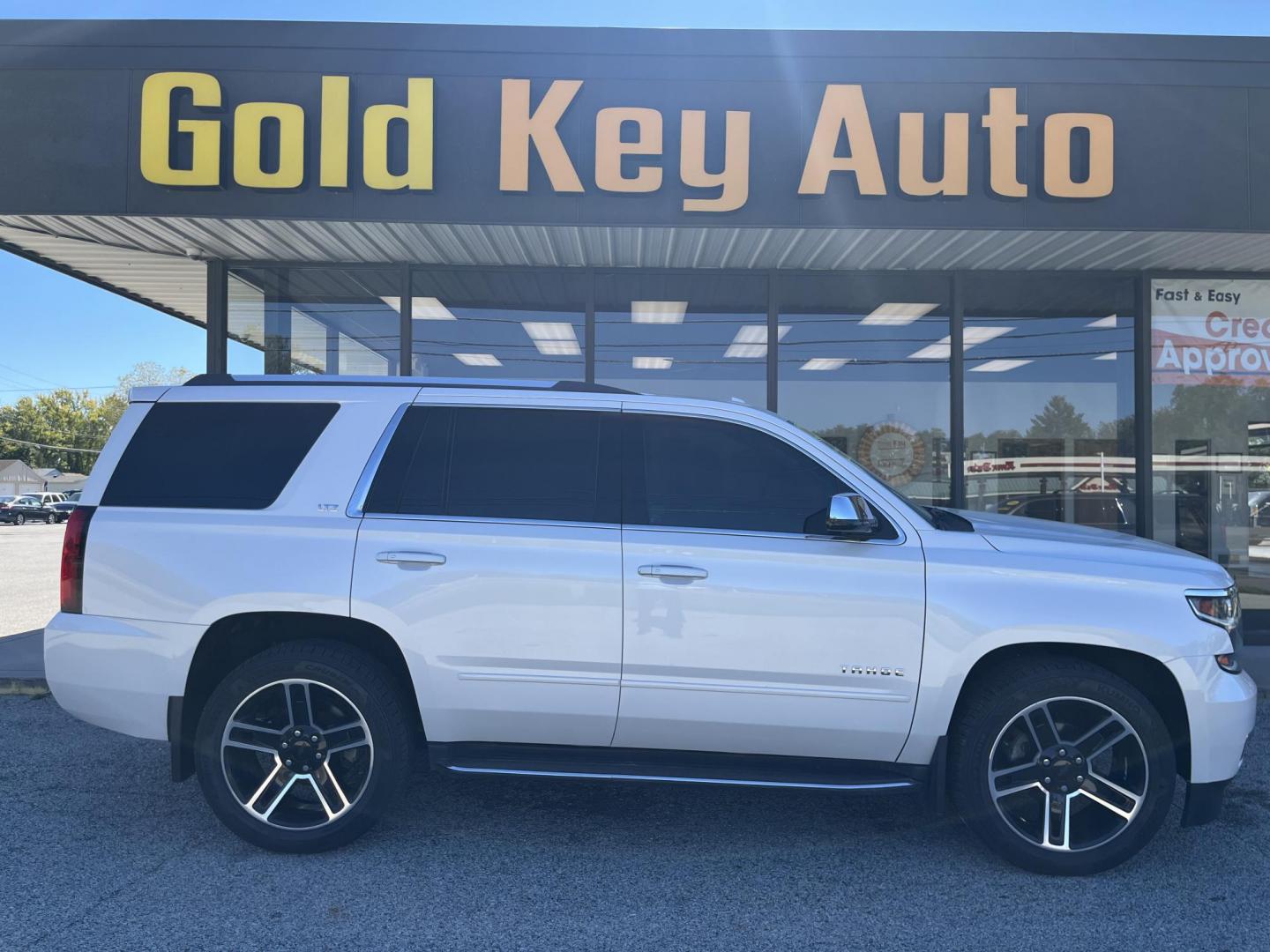 2016 Summit White Chevrolet Tahoe LTZ 4WD (1GNSKCKC2GR) with an 5.3L V8 OHV 16V engine, 6A transmission, located at 1633 W Kimberly, Davenport, IA, 52806, (563) 323-5341, 41.559456, -90.598732 - Photo#0