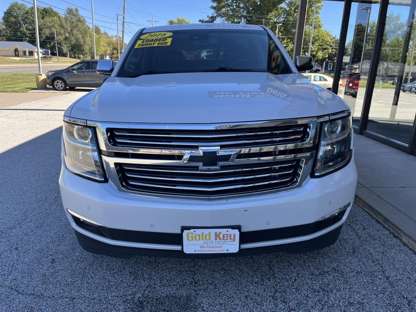 2016 Summit White Chevrolet Tahoe LTZ 4WD (1GNSKCKC2GR) with an 5.3L V8 OHV 16V engine, 6A transmission, located at 1633 W Kimberly, Davenport, IA, 52806, (563) 323-5341, 41.559456, -90.598732 - Photo#1