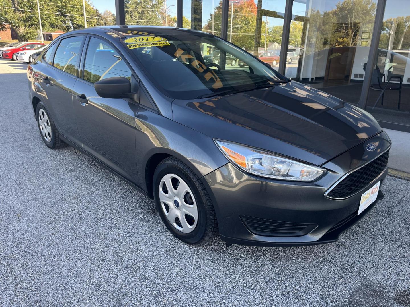 2017 Magnetic Metallic Ford Focus S Sedan (1FADP3E20HL) with an 2.0L L4 DOHC 16V engine, 5M transmission, located at 1633 W Kimberly, Davenport, IA, 52806, (563) 323-5341, 41.559456, -90.598732 - Photo#2