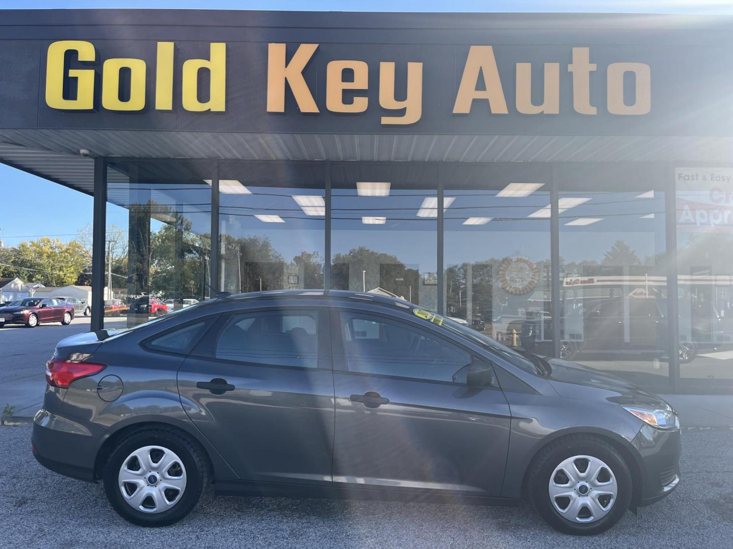 2017 Magnetic Metallic Ford Focus S Sedan (1FADP3E20HL) with an 2.0L L4 DOHC 16V engine, 5M transmission, located at 1633 W Kimberly, Davenport, IA, 52806, (563) 323-5341, 41.559456, -90.598732 - Photo#0