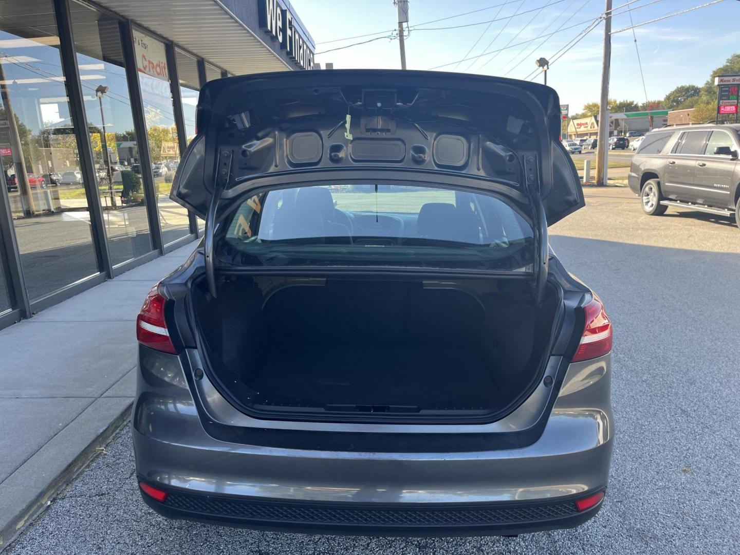 2017 Magnetic Metallic Ford Focus S Sedan (1FADP3E20HL) with an 2.0L L4 DOHC 16V engine, 5M transmission, located at 1633 W Kimberly, Davenport, IA, 52806, (563) 323-5341, 41.559456, -90.598732 - Photo#4