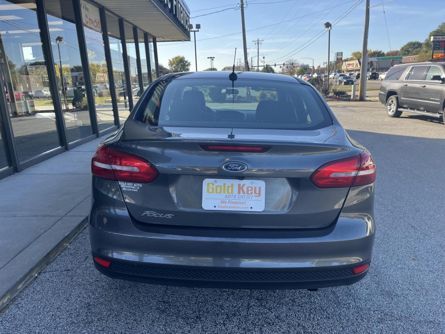 2017 Magnetic Metallic Ford Focus S Sedan (1FADP3E20HL) with an 2.0L L4 DOHC 16V engine, 5M transmission, located at 1633 W Kimberly, Davenport, IA, 52806, (563) 323-5341, 41.559456, -90.598732 - Photo#3